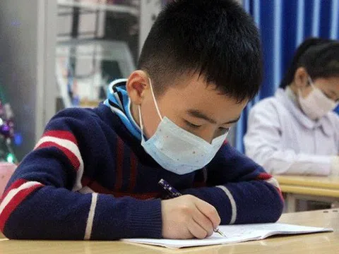Học sinh Tiểu học và THCS Hà Nội nghỉ hết 29/3, TPHCM nghỉ hết 5/4
